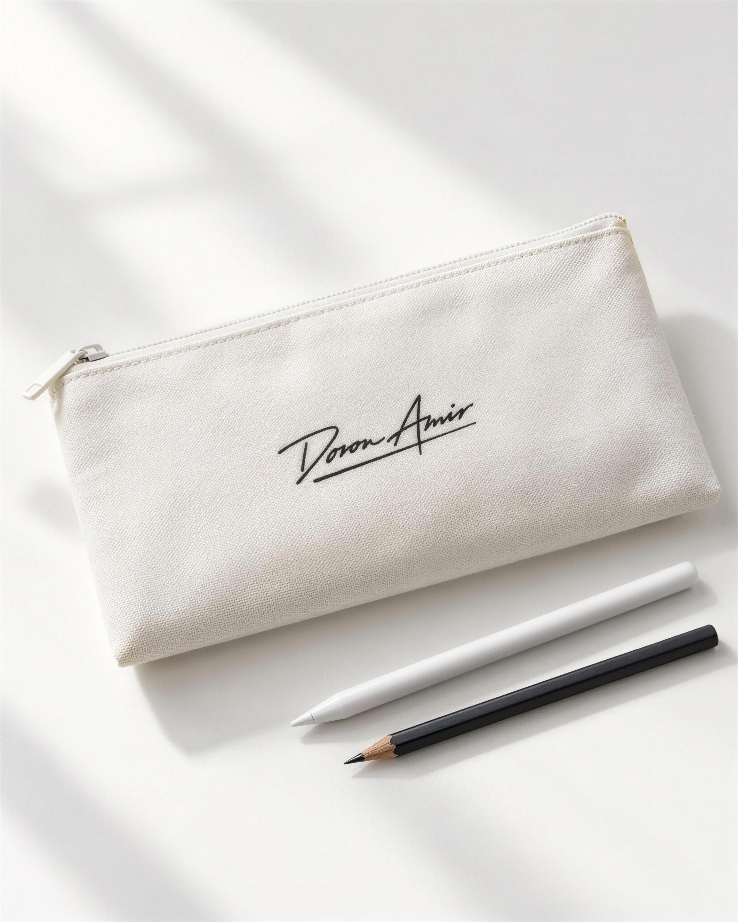 Canvas pencil case with the Doron Amir signature