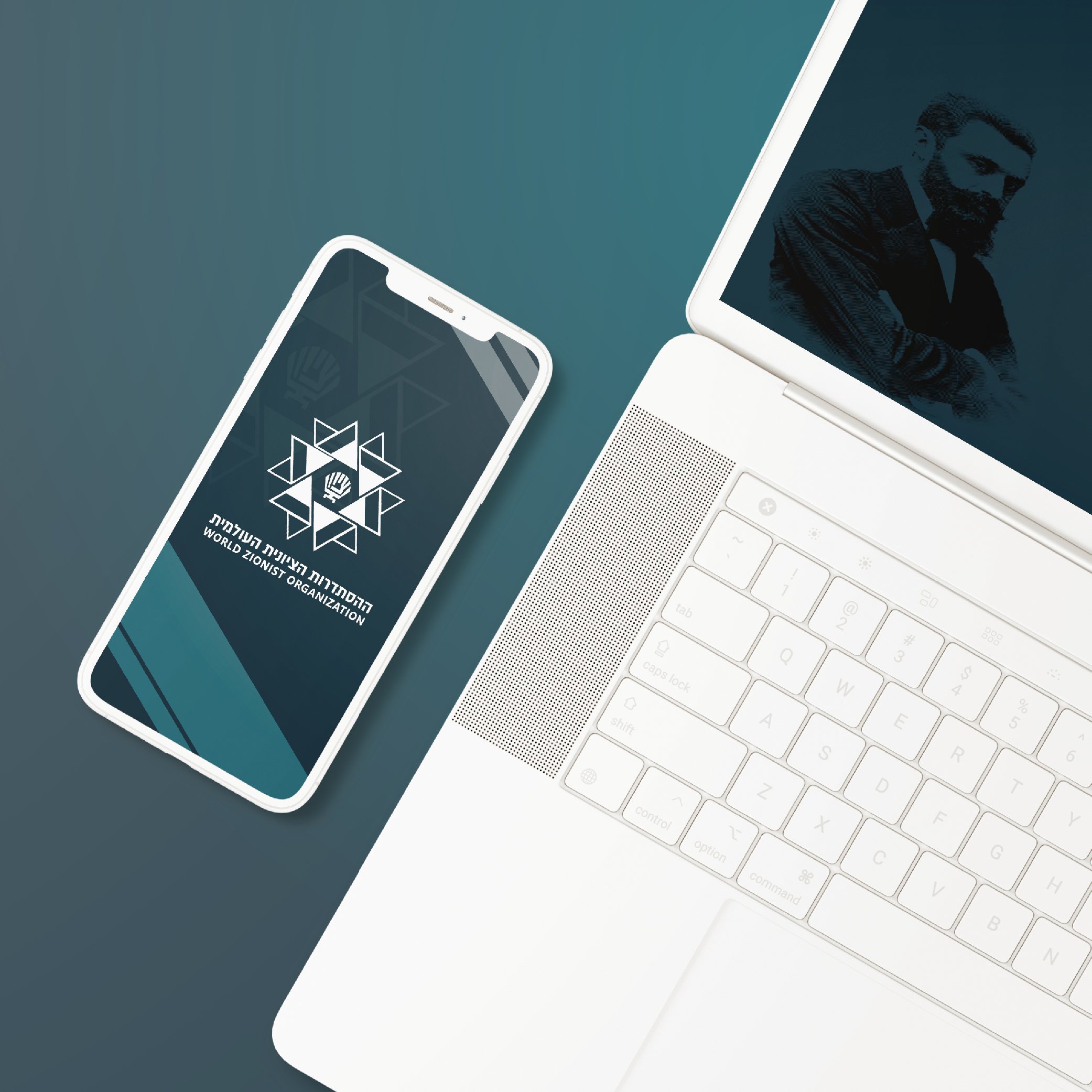 World Zionist Organization emblem on a phone screen beside a laptop